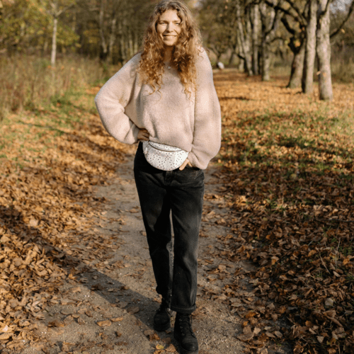 Beautiful woman wearing a midi dress with chunky boots 