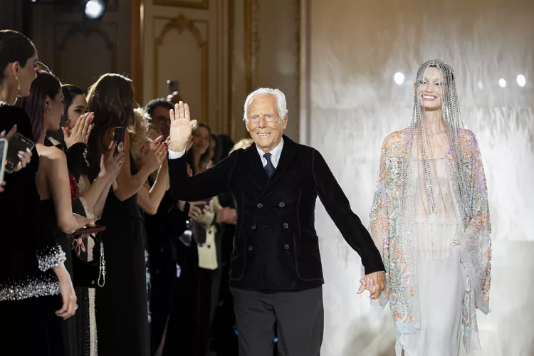 Giorgio Armani accepts applause at the end of his 2025 Paris Haute Couture show.